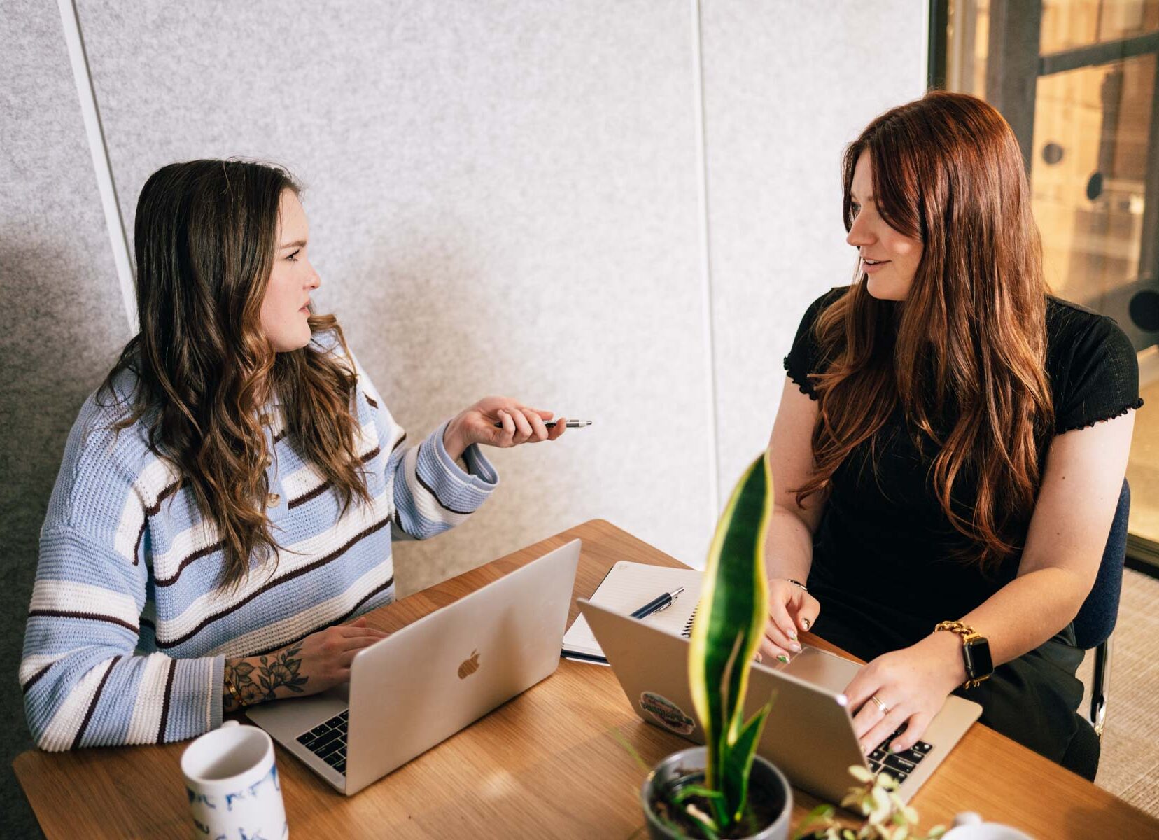 woman strategize on a project together